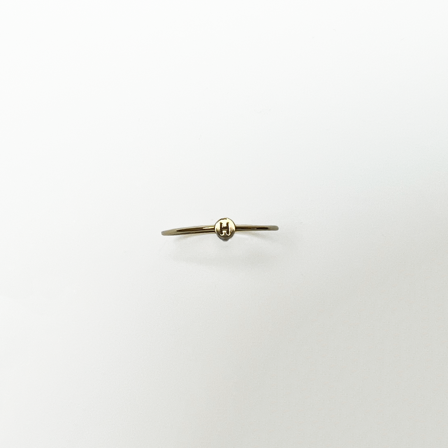 tiny initial ring